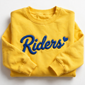 A folded yellow crewneck sweatshirt with 'Riders' embroidered in blue across the chest, set against a plain white background.